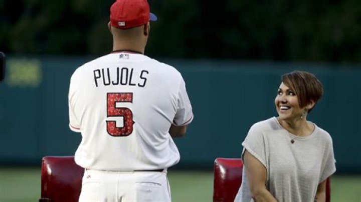 Does Deidre Pujols live in St Louis? Does Albert Pujols speak English