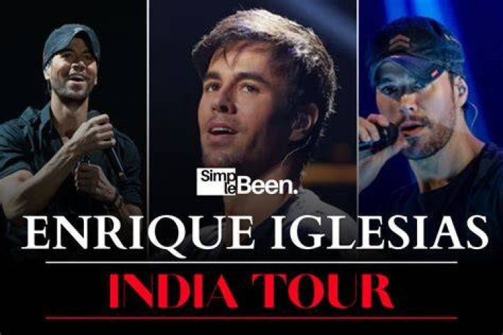 Enrique Iglesias performs in a navy blue shirt and a cap