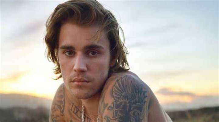 Justin Bieber's ugly mustache isn't going away anytime soon