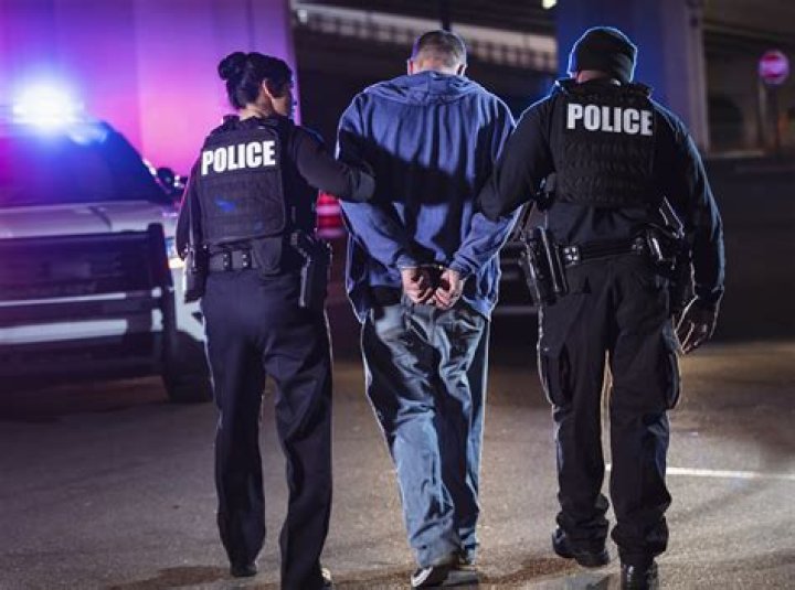 Police under fire for arrest of woman who tried to give money to