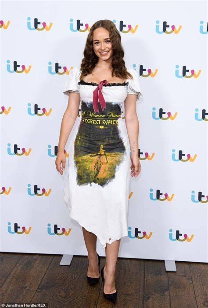 Rose Williams turns heads in a figurehugging milkmaid dress Rose